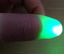 Load image into Gallery viewer, Magic Makers Red Light Up Thumb Tips