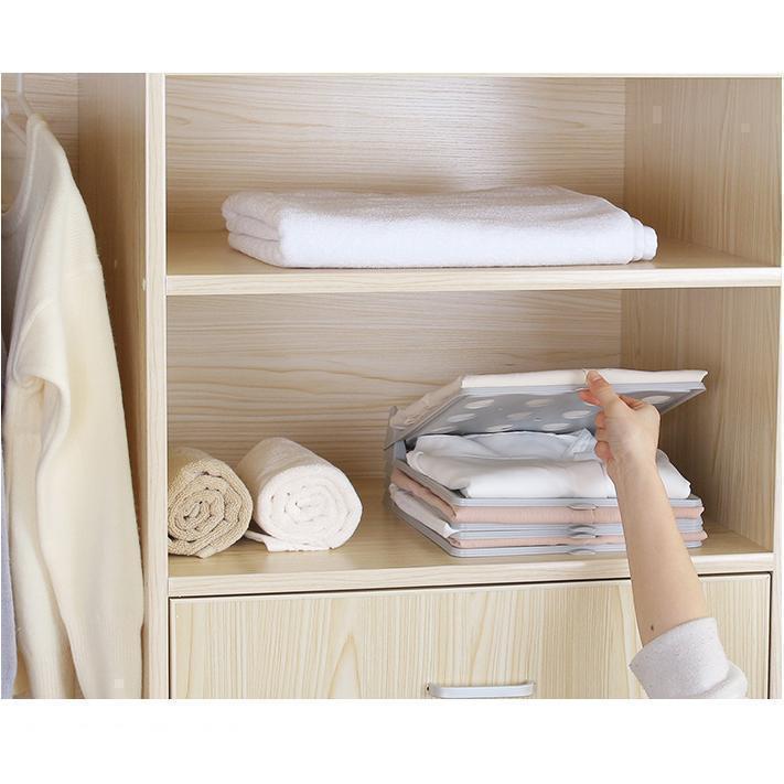 Creative clothing storage folding board